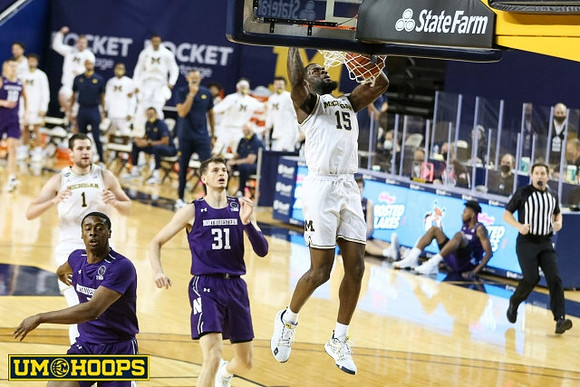 Chaundee Brown Jr. (15) and Hunter Dickinson (1)