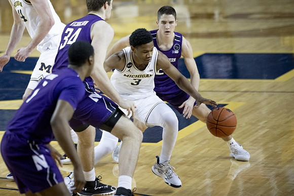 Jaron Faulds (44) and Isaiah Livers (2)