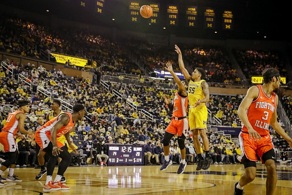 Eli Brooks (55) and Moussa Diabate (14)
