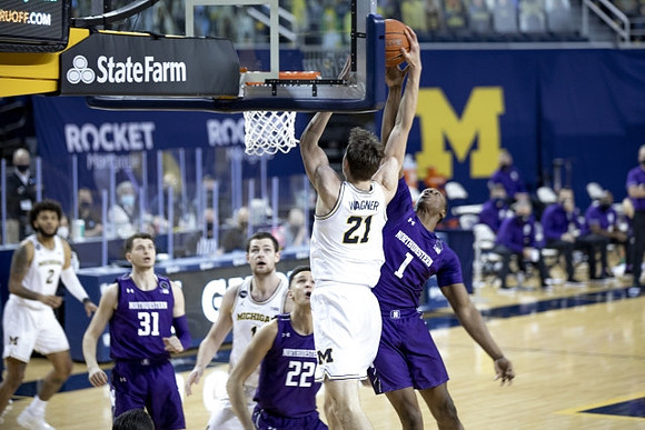 Isaiah Livers (2), Hunter Dickinson (1), and Franz Wagner (21)