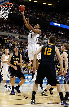 Glenn Robinson III (1) and Mitch McGary (4)