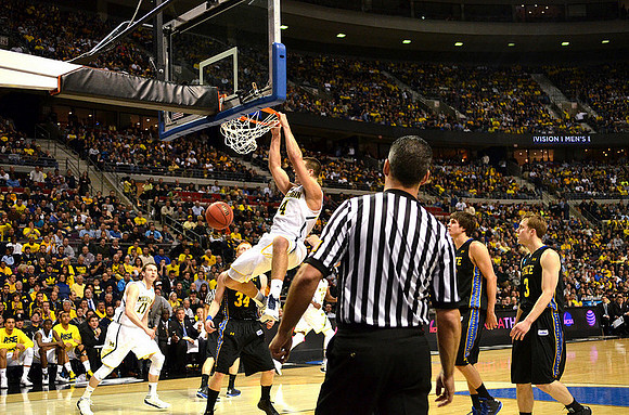 Nik Stauskas (11) and Mitch McGary (4)