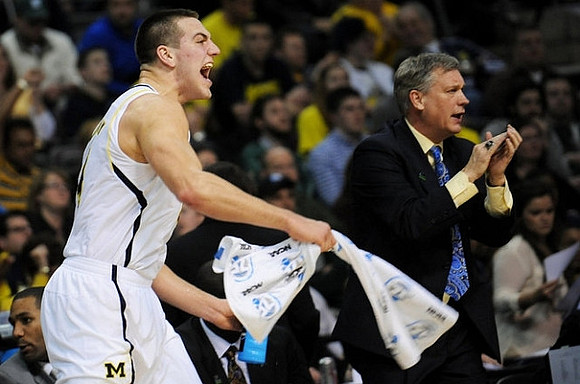 Mitch McGary (4) and Jeff Meyer