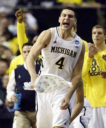 Mitch McGary (4) and Max Bielfeldt (44)