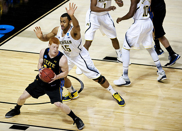 Jon Horford (15), Glenn Robinson III (1), and Tim Hardaway Jr. (10)
