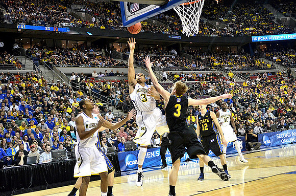 Glenn Robinson III (1), Trey Burke (3), and Tim Hardaway Jr. (10)