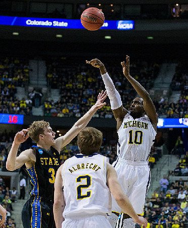 Spike Albrecht (2) and Tim Hardaway Jr. (10)