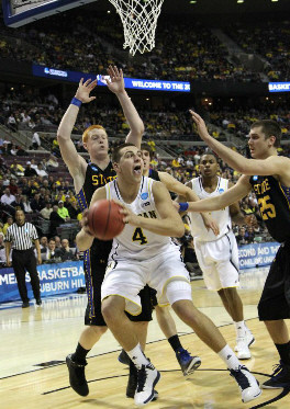 Mitch McGary (4) and Glenn Robinson III (1)