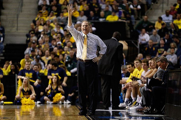John Beilein, Bacari Alexander, and Jeff Meyer