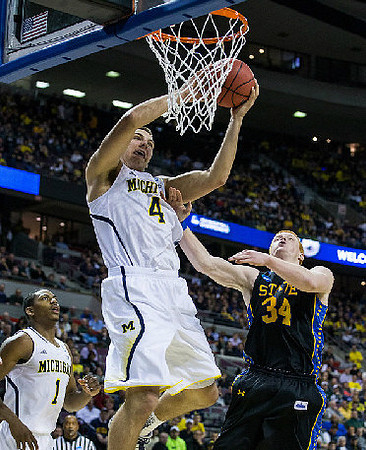 Mitch McGary (4) and Glenn Robinson III (1)