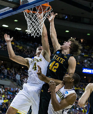 Mitch McGary (4) and Glenn Robinson III (1)