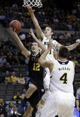 Nik Stauskas (11) and Mitch McGary (4)