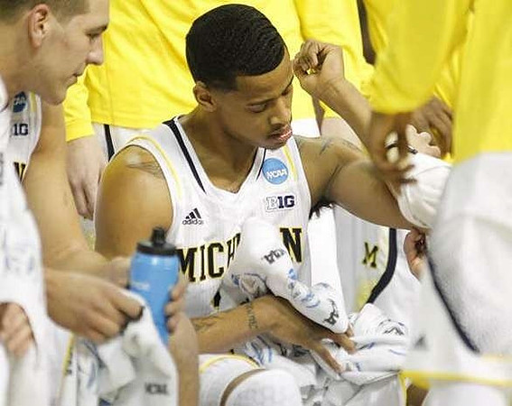 Mitch McGary (4) and Trey Burke (3)