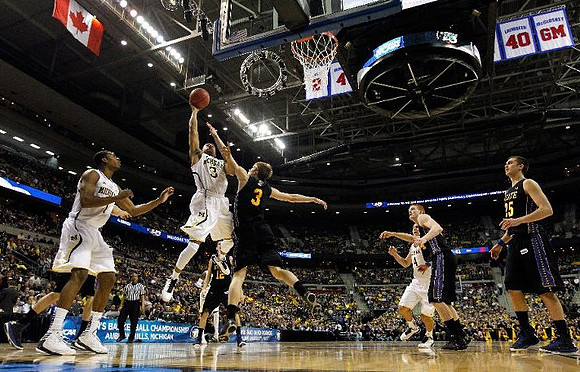 Glenn Robinson III (1), Trey Burke (3), and Mitch McGary (4)