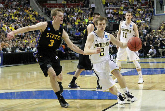 Spike Albrecht (2) and Nik Stauskas (11)