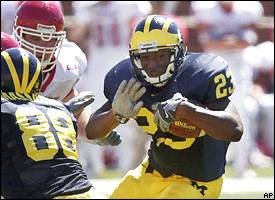 Chris Perry (23) and Tim Massaquoi (88)