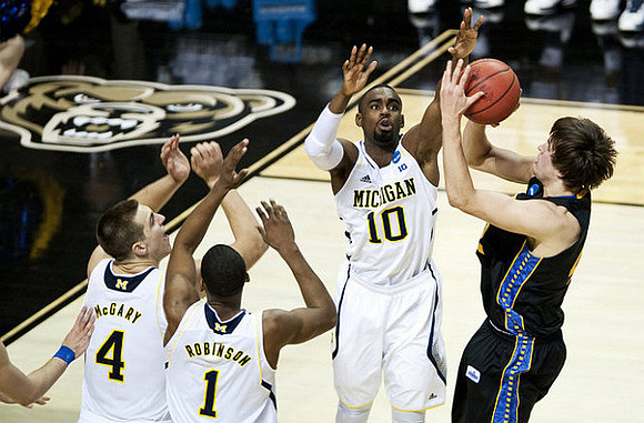 Mitch McGary (4), Glenn Robinson III (1),  and Tim Hardaway Jr. (10)