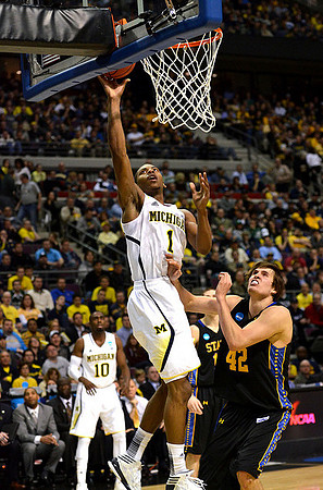 Glenn Robinson III (1) and Tim Hardaway Jr. (10)