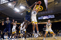 Hunter Dickinson (1) and Moussa Diabate (14)