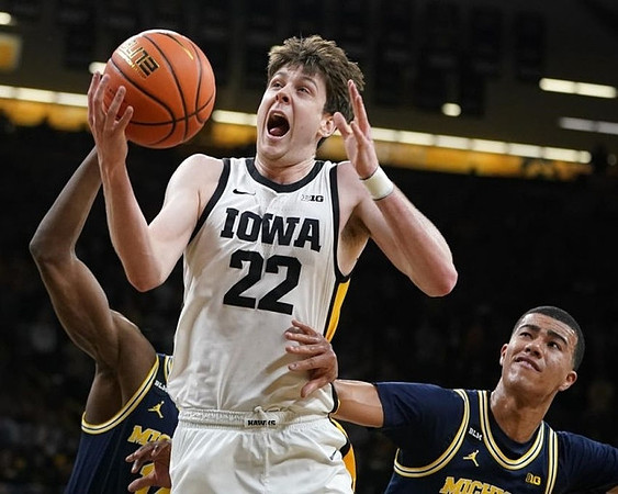 Caleb Houstan (22) and Moussa Diabate (14)