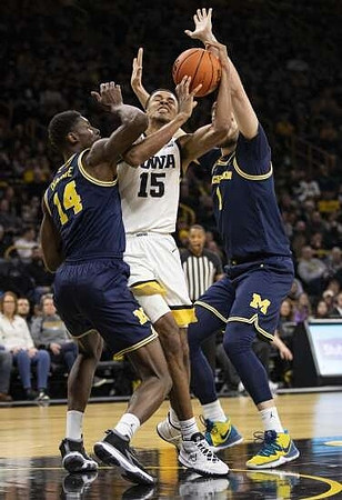 Moussa Diabate (14) and Hunter Dickinson (1)