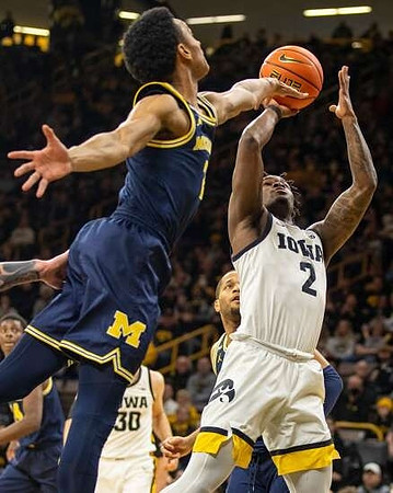 Kobe Bufkin (2), DeVante' Jones (12), and Moussa Diabate (14)