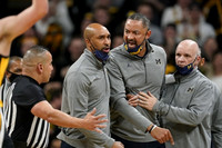Saddi Washington, Juwan Howard, and Phil Martelli