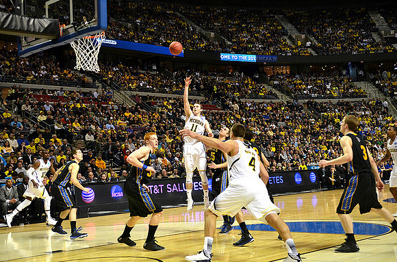 Tim Hardaway Jr. (10), Nik Stauskas (11), Mitch McGary (4), and Glenn Robinson III (1)