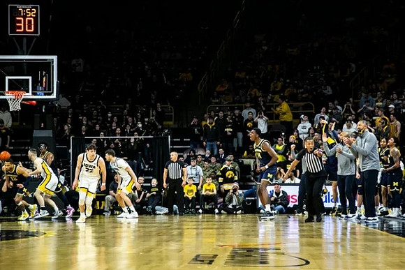 DeVante' Jones (12) and Moussa Diabate (14)