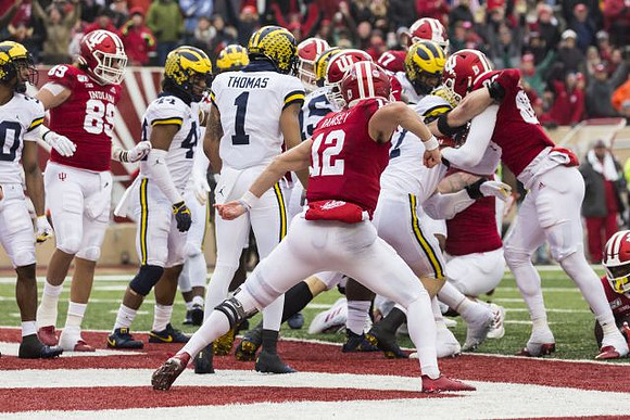 Daxton Hill (30), Cameron McGrone (44), Ambry Thomas (1), and Khaleke Hudson (7)