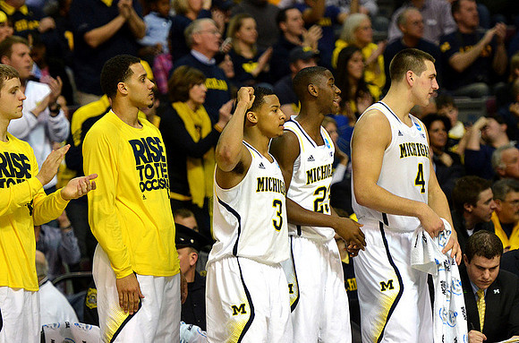 Max Bielfeldt (44), Jordan Morgan (52), Trey Burke (3), Caris LeVert (23), and Mitch McGary (4)