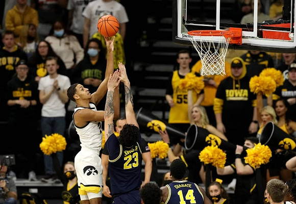 Brandon Johns Jr. (23) and Moussa Diabate (14)
