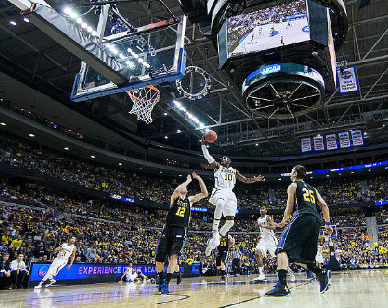Trey Burke (3),  Tim Hardaway Jr. (10), and Glenn Robinson III (1)