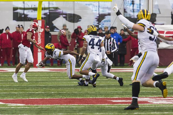 Daxton Hill (30), Cameron McGrone (44), and Aidan Hutchinson (97)