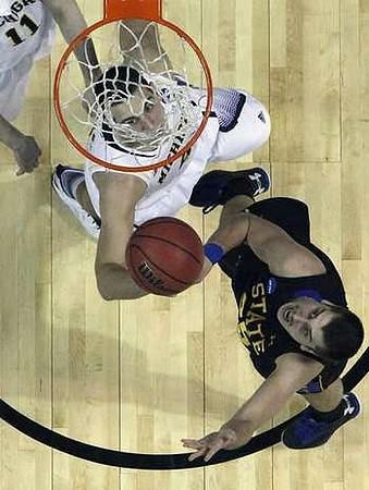 Mitch McGary (4) and Nik Stauskas (11)