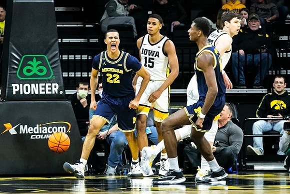 Caleb Houstan (22) and Moussa Diabate (14)