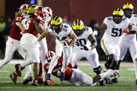 Zach Charbonnet (24), Michael Onwenu (50), Cesar Ruiz (51), and Nick Eubanks (82)