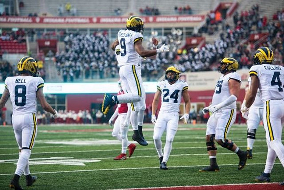 Ronnie Bell (8), Donovan Peoples-Jones (9), Zach Charbonnet (24), Jon Runyan Jr. (75), and Nico Collins (4)