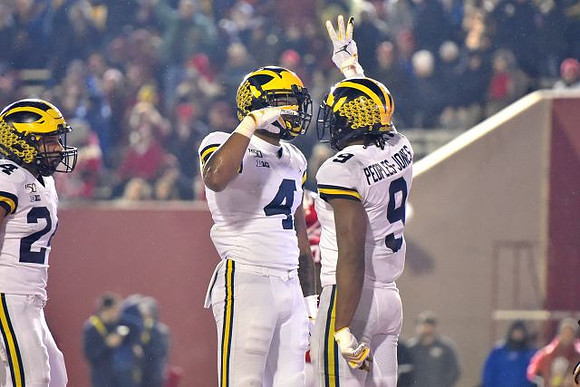 Zach Charbonnet (24), Nico Collins (4), and Donovan Peoples-Jones (9)