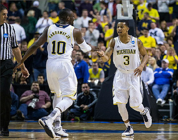 Tim Hardaway Jr. (10) and Trey Burke (3)