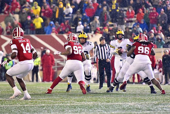 Jalen Mayfield (73) and Shea Patterson (2)