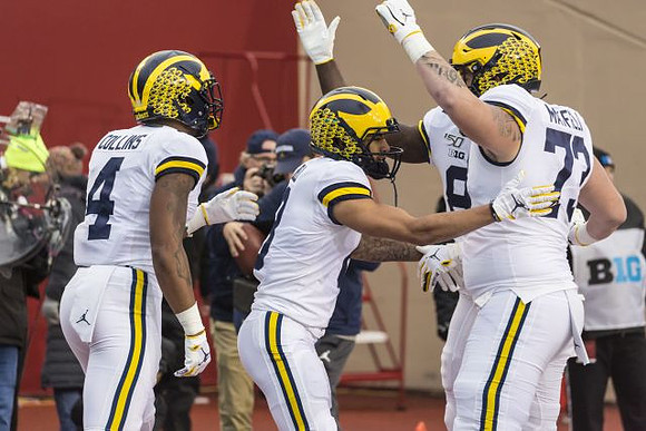 Nico Collins (4), Ronnie Bell (8), and Jalen Mayfield (73)