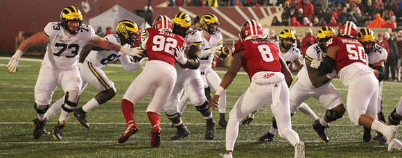 Jalen Mayfield (73), Nick Eubanks (82), Michael Onwenu (50), Shea Patterson (2), Zach Charbonnet (24), Cesar Ruiz (51), and Ben Bredeson (74)