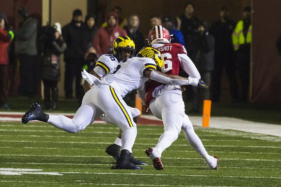 Daxton Hill (30) and Josh Uche (6)