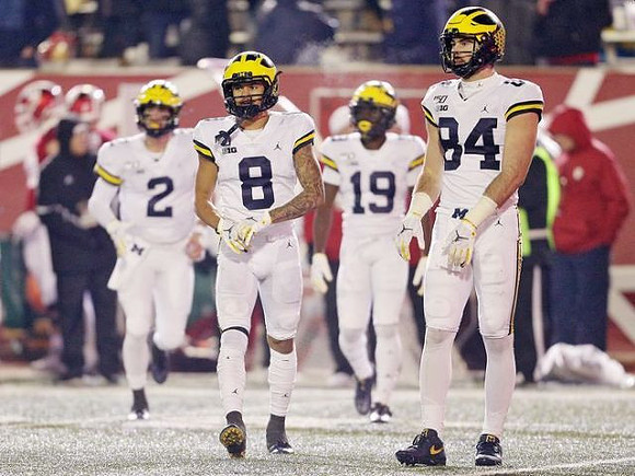 Shea Patterson (2), Ronnie Bell (8), Mike Sainristil (19), and Sean McKeon (84)