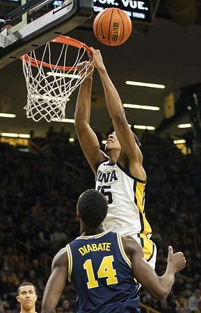 Moussa Diabate (14) and Caleb Houstan (22)