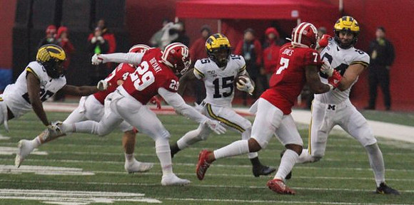 Hassan Haskins (25), Giles Jackson (15), and Sean McKeon (84)