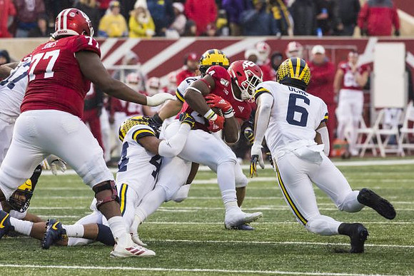 Cameron McGrone (44) and Josh Uche (6)