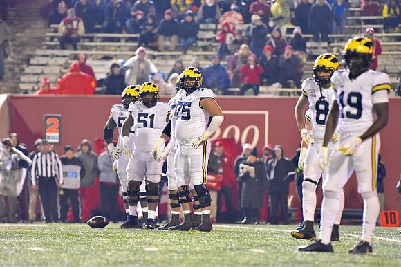 Michael Onwenu (50), Cesar Ruiz (51), Jon Runyan Jr. (75), Ronnie Bell (8), and Mike Sainristil (19)