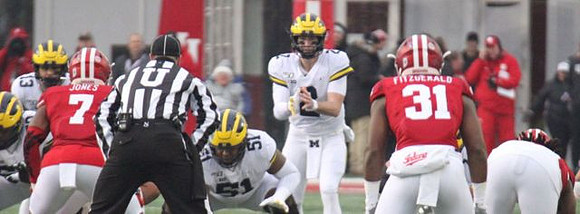 Tru Wilson (13), Cesar Ruiz (51), and Shea Patterson (2)
